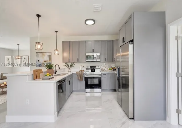 Photo 4 of Single family home for sale at 211 Nw 14Th Ct, Dania, FL 33004 | MLS# A12046099 | Listing updated on 2026-09-04