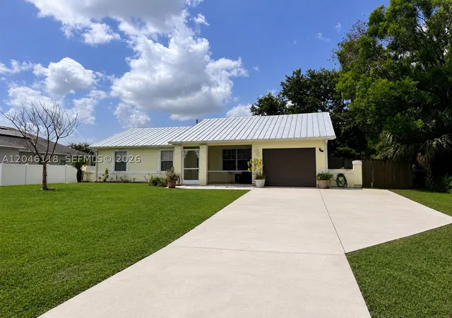 Photo 1 of Single family home for sale at 5411 Nw Consumer Ave, Port Saint Lucie, FL 34983 | MLS# A12046118 | Listing updated on 2026-08-31