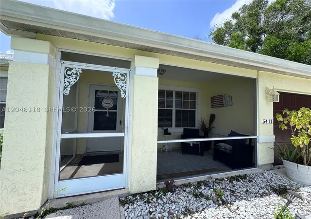 Photo 2 of Single family home for sale at 5411 Nw Consumer Ave, Port Saint Lucie, FL 34983 | MLS# A12046118 | Listing updated on 2026-08-31