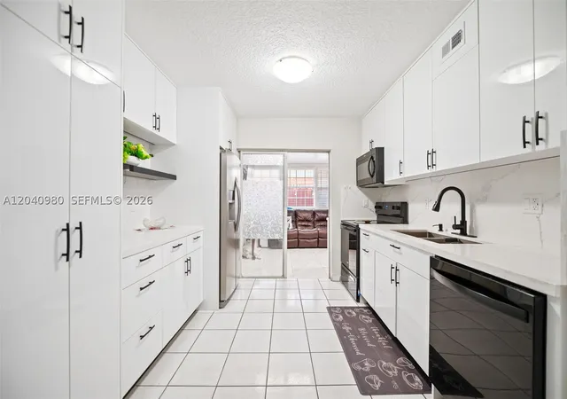 Photo 3 of Condo for sale at 7817 W 36th Ave #101, Hialeah, FL 33018 | MLS# A12040980 | Listing updated on 2026-10-03