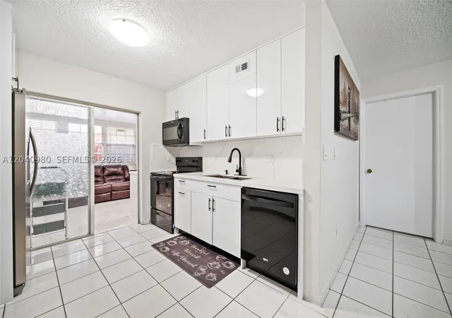 Listing Photo 5 - Condo for sale in building located at 7817 W 36Th Ave, Hialeah, FL 33018 - Unit #101