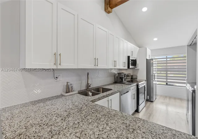 Photo 3 of Townhouse for sale at 10311 Laurel Ct, Pembroke Pines, FL 33026 | MLS# A12046740 | Listing updated on 2026-08-28