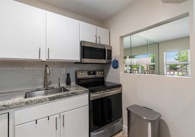 Photo 3 of Condo for sale at 9101 Sunrise Lakes Blvd #202, Sunrise, FL 33322 | MLS# A12046732 | Listing updated on 2026-09-15