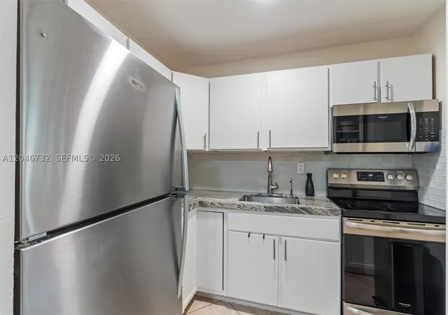 Photo 4 of Condo for sale at 9101 Sunrise Lakes Blvd #202, Sunrise, FL 33322 | MLS# A12046732 | Listing updated on 2026-09-15
