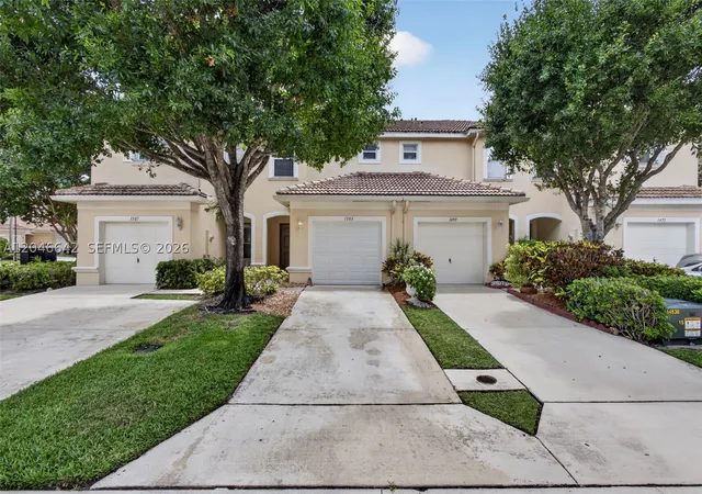 Photo 1 of Townhouse for sale at 1503 New Castle Ter, Wellington, FL 33414 | MLS# A12046642 | Listing updated on 2026-10-06