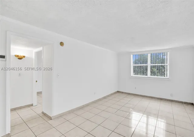 Listing Photo 4 - Condo for sale in building located at 606 W 81St St, Miami, FL 33014 - Unit #323