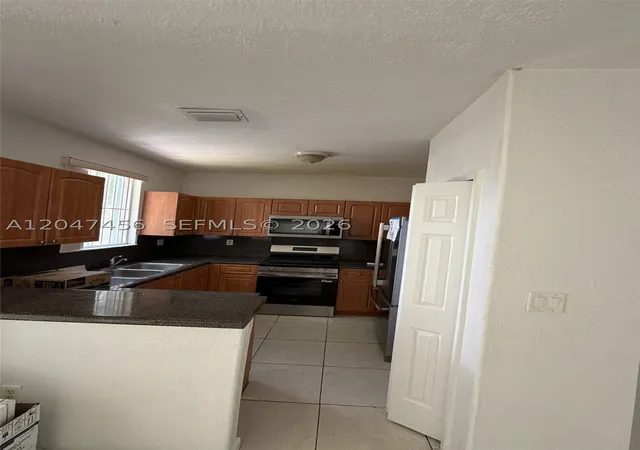 Photo 2 of Condo for sale at 2432 Se 14th Ave #277, Homestead, FL 33035 | MLS# A12047456 | Listing updated on 2026-09-04