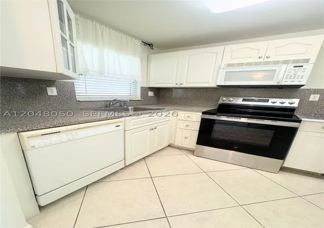 Photo 1 of Condo for sale at 9660 Sunrise Lakes Blvd #202, Sunrise, FL 33322 | MLS# A12048050 | Listing updated on 2026-09-16
