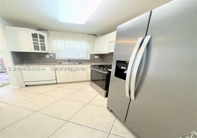 Photo 3 of Condo for sale at 9660 Sunrise Lakes Blvd #202, Sunrise, FL 33322 | MLS# A12048050 | Listing updated on 2026-09-16