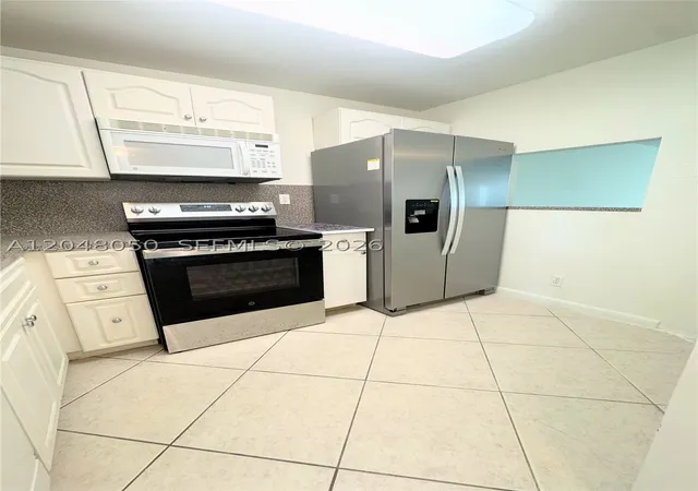 Photo 3 of Condo for sale at 9660 Sunrise Lakes Blvd #202, Sunrise, FL 33322 | MLS# A12048050 | Listing updated on 2026-09-16