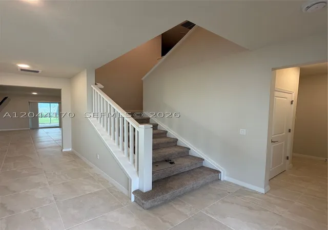 Photo 2 of Single family home for sale at 12251 Sw Periwinkle Ct, Port Saint Lucie, FL 34987 | MLS# A12044170 | Listing updated on 2026-09-08
