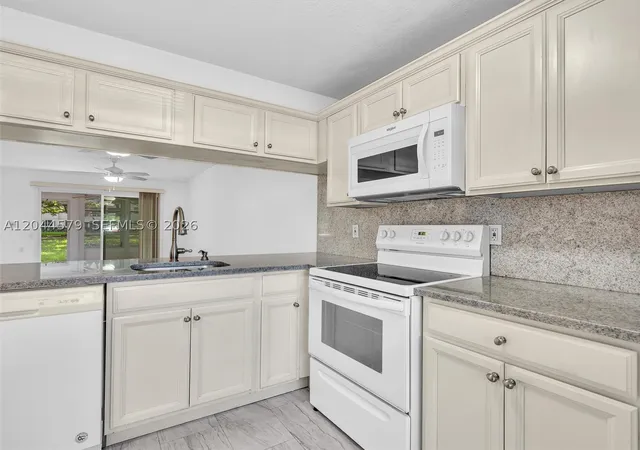 Photo 3 of Condo for sale at 1212 Se Bahama Bnd #G1, Coconut Creek, FL 33066 | MLS# A12044579 | Listing updated on 2026-08-31