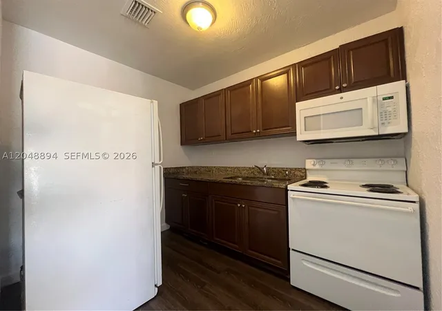 Photo 3 of Multi family home for sale at 3024 Nw 2nd St, Pompano Beach, FL 33069 | MLS# A12048894 | Listing updated on 2026-08-26