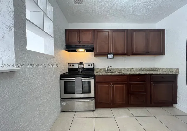 Photo 3 of Multi family home for sale at 3028 Nw 2nd St, Pompano Beach, FL 33069 | MLS# A12048905 | Listing updated on 2026-08-26