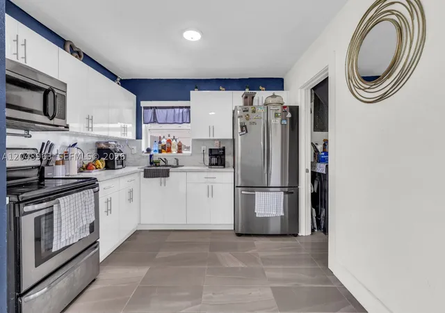 Photo 2 of Single family home for sale at 14404 Sw 105th Ct, Miami, FL 33176 | MLS# A12048963 | Listing updated on 2026-09-10