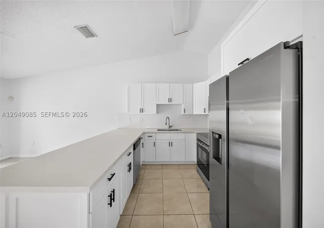 Photo 2 of Single family home for sale at 14412 Sw 115th St, Miami, FL 33186 | MLS# A12049085 | Listing updated on 2026-10-06