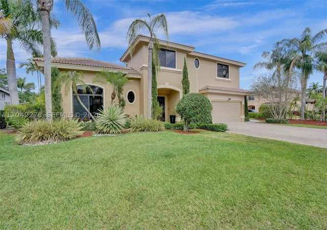 Photo 2 of Single family home for sale at 303 Nw 119th Dr, Coral Springs, FL 33071 | MLS# A12049278 | Listing updated on 2026-08-31