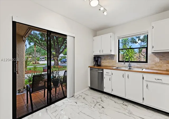 Photo 3 of Townhouse for sale at 901 Nw 26th Ave, Delray Beach, FL 33445 | MLS# A12049036 | Listing updated on 2026-08-27
