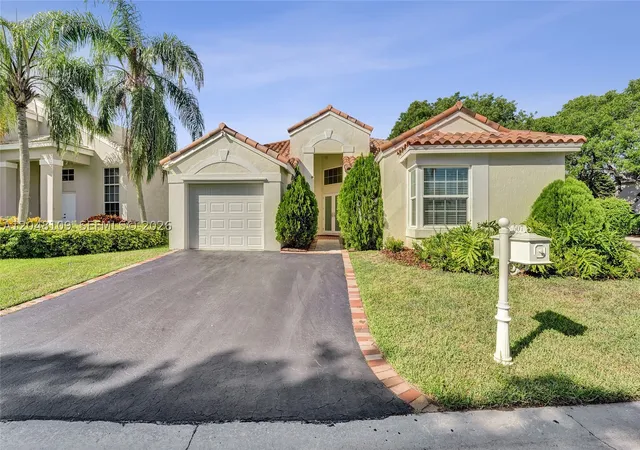 Single family home for sale at 507 Bridgeton Rd, Weston, FL 33326 | MLS# A12048109