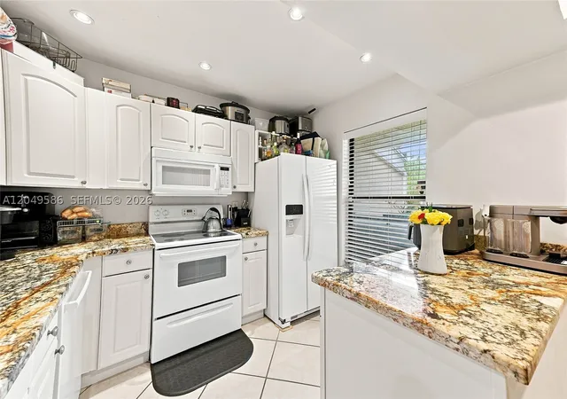 Photo 2 of Condo for sale at 9858 Nw 3rd St #9858, Plantation, FL 33324 | MLS# A12049586 | Listing updated on 2026-09-08