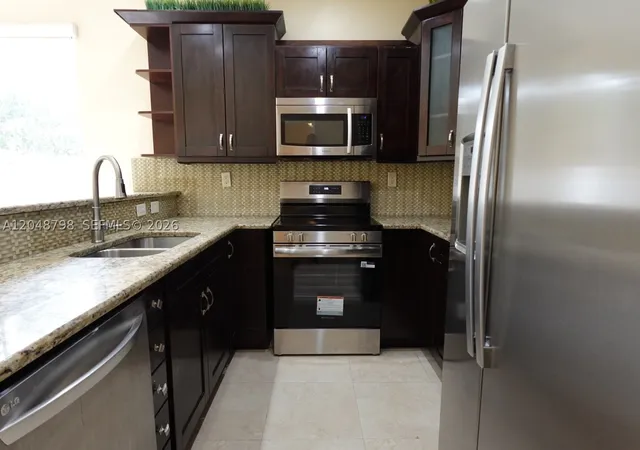 Photo 2 of Townhouse for sale at 16102 Nw 22nd St, Pembroke Pines, FL 33028 | MLS# A12048798 | Listing updated on 2026-09-06