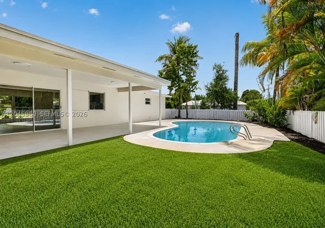 Photo 2 of Single family home for sale at 7040 Nw 8th Ct, Plantation, FL 33317 | MLS# A12045980 | Listing updated on 2026-09-06