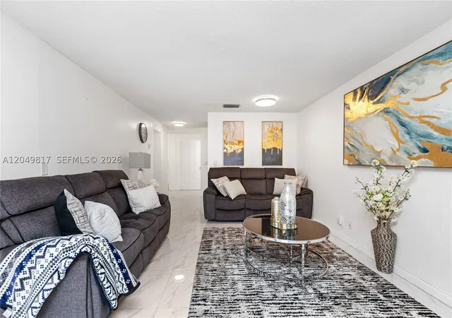 Photo 1 of Townhouse for sale at 1580 Nw 93rd Ave #300, Pembroke Pines, FL 33024 | MLS# A12049817 | Listing updated on 2026-08-28