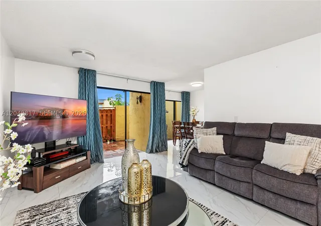 Photo 2 of Townhouse for sale at 1580 Nw 93rd Ave #300, Pembroke Pines, FL 33024 | MLS# A12049817 | Listing updated on 2026-08-28