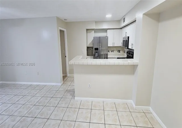 Photo 2 of Condo for sale at 1707 Village Blvd #208, West Palm Beach, FL 33409 | MLS# A12050451 | Listing updated on 2026-09-11