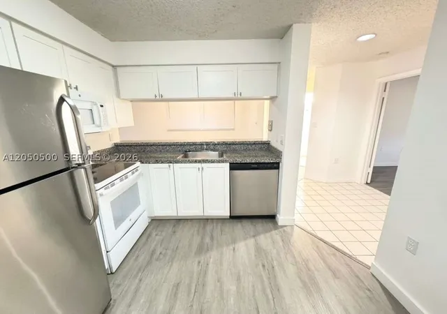 Photo 3 of Condo for sale at 14208 Glenmoor Dr #14208, West Palm Beach, FL 33409 | MLS# A12050500 | Listing updated on 2026-09-11