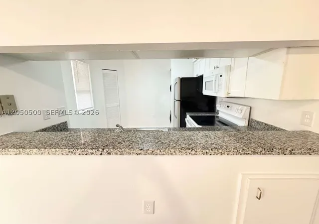 Photo 4 of Condo for sale at 14208 Glenmoor Dr #14208, West Palm Beach, FL 33409 | MLS# A12050500 | Listing updated on 2026-09-11