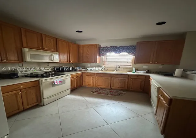 Photo 2 of Sale Pending at 7558 Nw 17th Dr, Hollywood, FL 33024 | MLS# A12049438 | Listing updated on 2026-09-18
