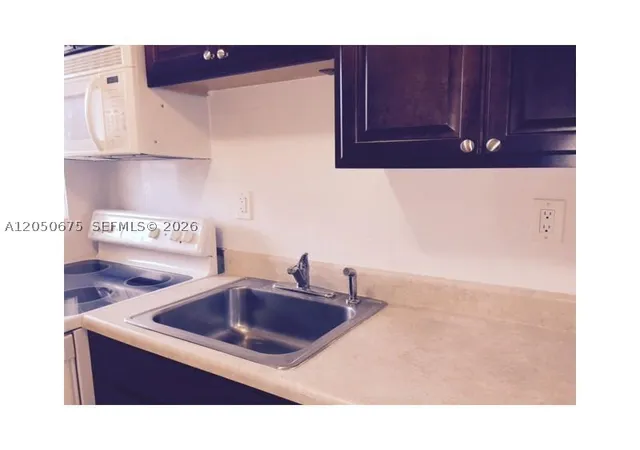 Listing Photo 4 - Condo for sale in building located at 1430 Ne 170Th St, Miami, FL 33162 - Unit #317