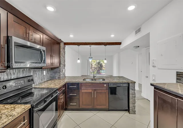 Photo 1 of Condo for sale at 1100 Nw 87th Ave #307, Coral Springs, FL 33071 | MLS# A12052329 | Listing updated on 2026-09-07