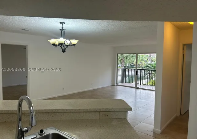 Photo 3 of Condo for sale at 8851 Wiles Rd #208, Coral Springs, FL 33067 | MLS# A12053368 | Listing updated on 2026-09-14