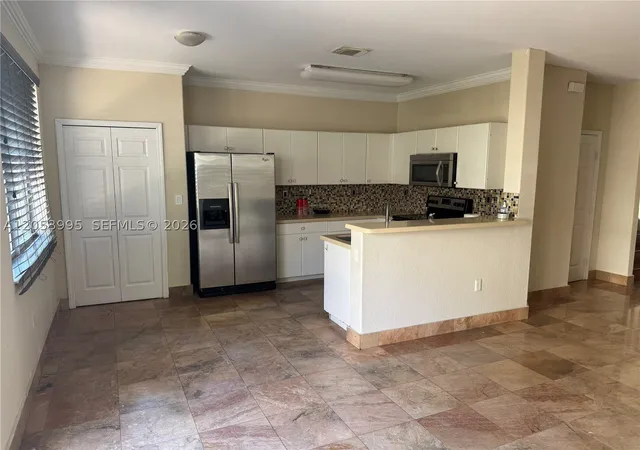 Photo 4 of Single family home for sale at 7651 Nw 114Th Path, Doral, FL 33178 | MLS# A12053995 | Listing updated on 2026-09-10