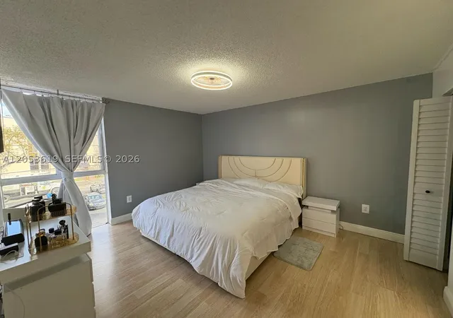 Listing Photo 4 - Condo for sale in building located at 7035 Nw 186Th St, Miami, FL 33015 - Unit #D302