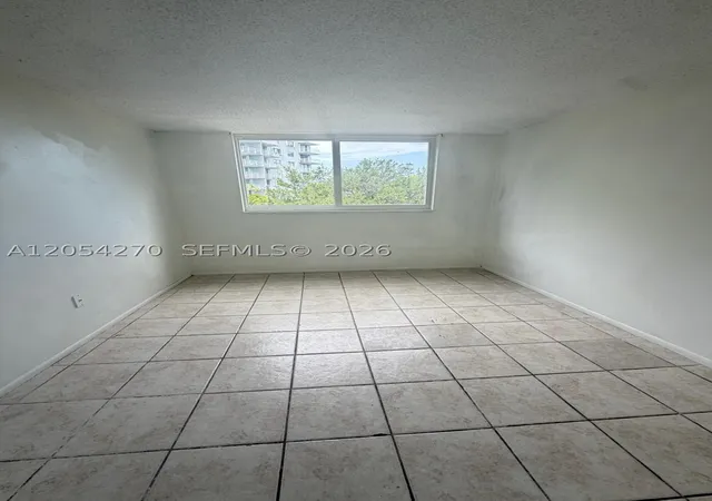 Photo 3 of Condo for sale at 12500 Ne 15th Ave #402, North Miami, FL 33161 | MLS# A12054270 | Listing updated on 2026-09-07