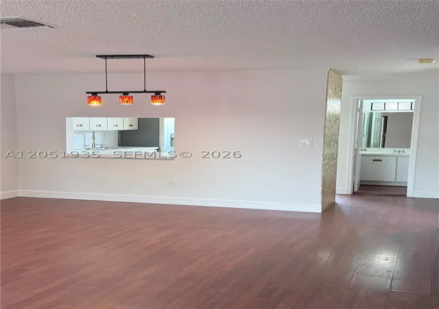 Listing Photo 4 - Condo for sale in building located at 9850 Hammocks Blvd, Miami, FL 33196 - Unit #107