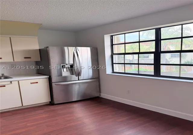 Listing Photo 5 - Condo for sale in building located at 9850 Hammocks Blvd, Miami, FL 33196 - Unit #107