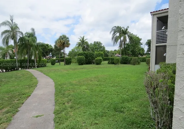 Photo 1 of Condo for sale at 7435 Woodmont Ter #101, Tamarac, FL 33321 | MLS# A12050338 | Listing updated on 2026-10-02