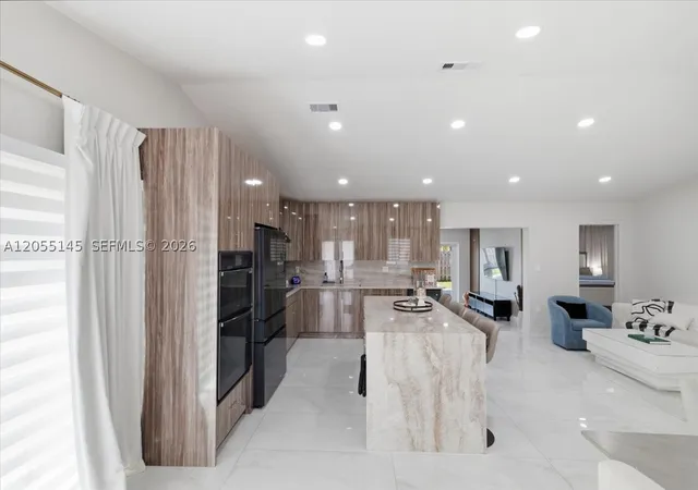 Photo 3 of Single family home for sale at 14874 Sw 56th Ter, Miami, FL 33193 | MLS# A12055145 | Listing updated on 2026-10-07