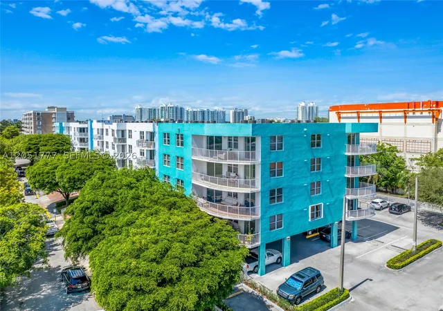 Listing Photo 1 - Condo for sale in building located at 1555 N Treasure Dr, South Miami, FL 33141 - Unit #207