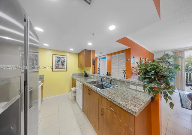 Listing Photo 3 - Condo for sale in building located at 1555 N Treasure Dr, South Miami, FL 33141 - Unit #207