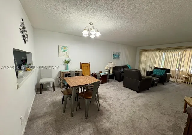 Photo 1 of Condo for sale at 8810 W Mcnab Rd #206, Tamarac, FL 33321 | MLS# A12055649 | Listing updated on 2026-08-26