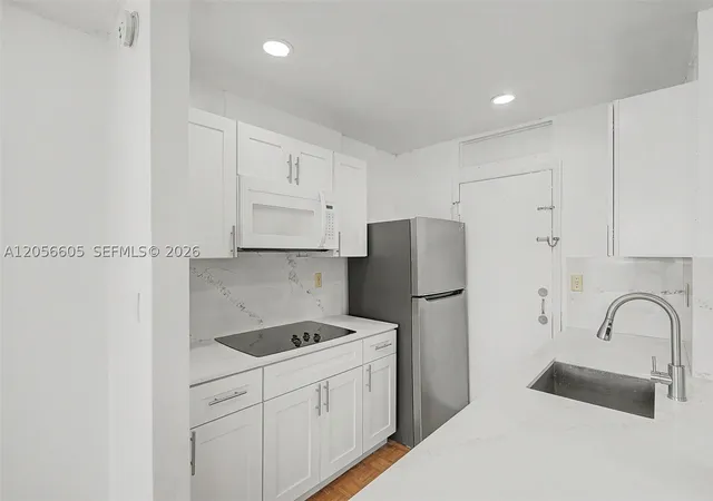 Photo 3 of Condo for sale at 12590 Ne 16th Ave #402, North Miami, FL 33161 | MLS# A12056605 | Listing updated on 2026-09-07