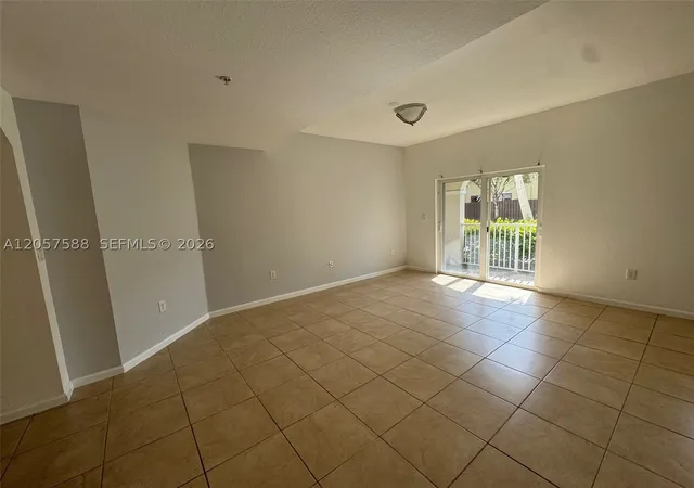 Photo 3 of Condo for sale at 11601 Nw 89 St #106, Doral, FL 33178 | MLS# A12057588 | Listing updated on 2026-09-14