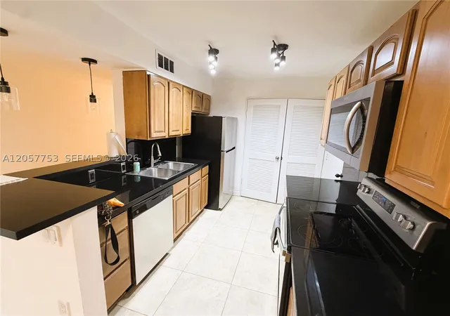 Photo 3 of Condo for sale at 7483 Sw 82nd St #A102, Miami, FL 33143 | MLS# A12057753 | Listing updated on 2026-09-10