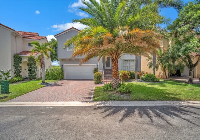 Photo 2 of Single family home for sale at 7565 Nw 19th Dr, Pembroke Pines, FL 33024 | MLS# A12058074 | Listing updated on 2026-09-15