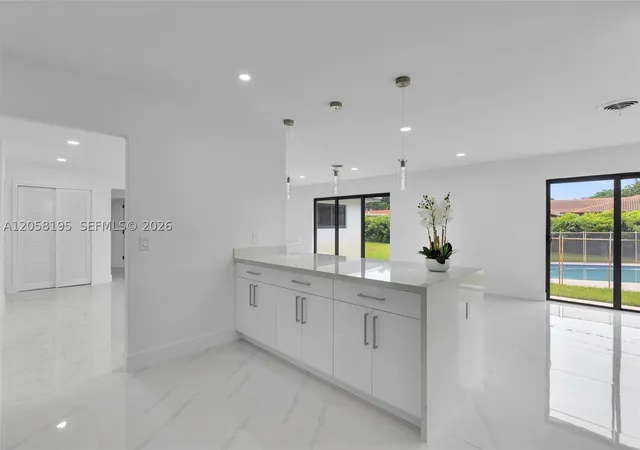 Photo 2 of Single family home for sale at 6940 Nw 6th St, Plantation, FL 33317 | MLS# A12058195 | Listing updated on 2026-09-13
